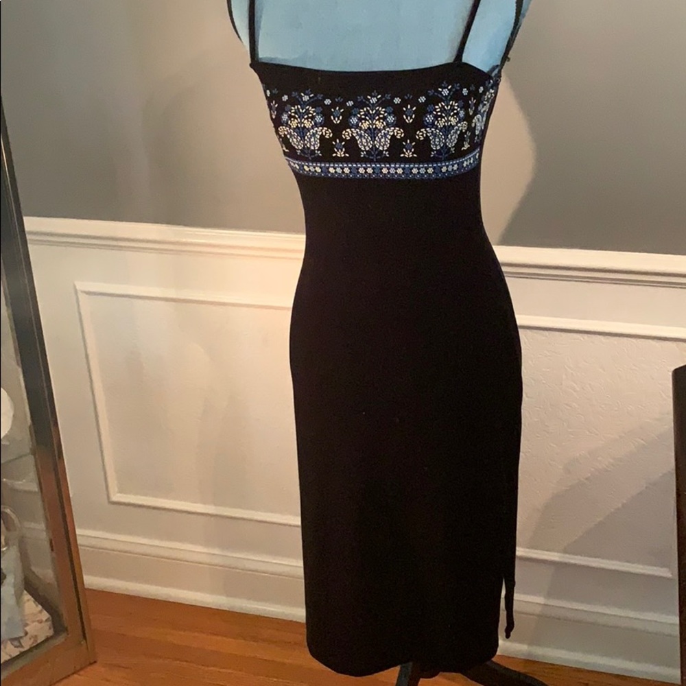 Black velvet feel detailed bodice beaded look.